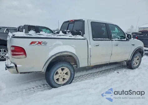 2002 Ford F150 Supercrew z USA, uszkodzony, nr VIN 1FTRW08L22KA73849